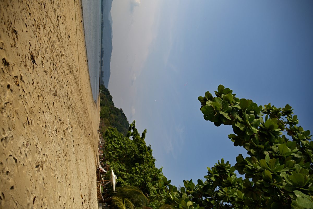 Ao Yon beach — long arc of sand, calm bay, palm shade